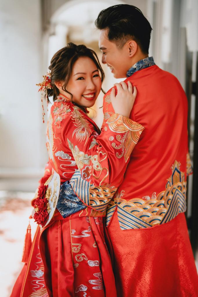 Elegant Chinese wedding dress featuring intricate embroidery and vibrant colors, symbolizing love and prosperity.