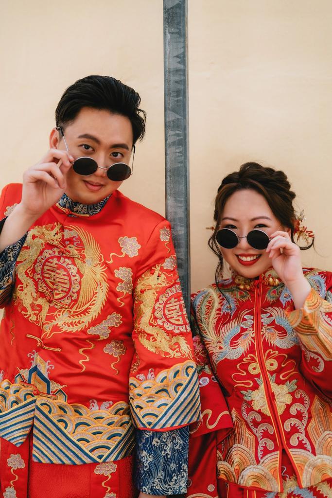 Elegant Chinese wedding dress featuring intricate embroidery and vibrant colors, symbolizing love and prosperity.