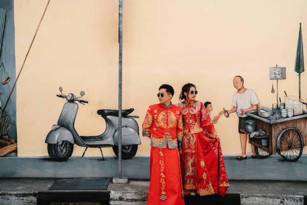 Elegant Chinese wedding dress featuring intricate embroidery and vibrant colors, symbolizing love and prosperity.