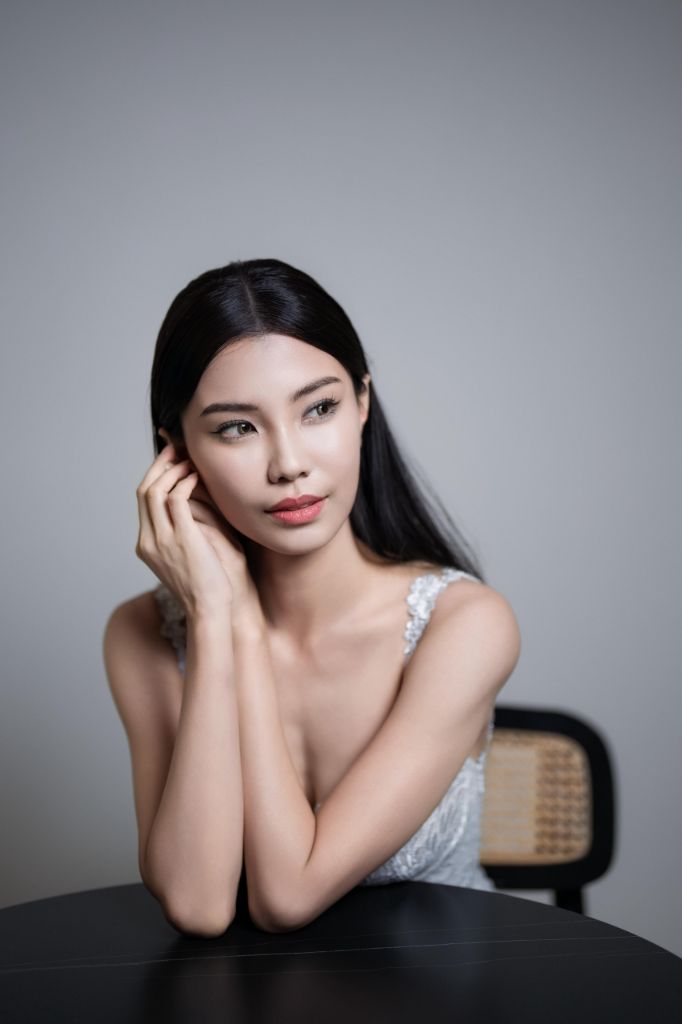 Studio bridal portrait with sleek straight hair and natural makeup