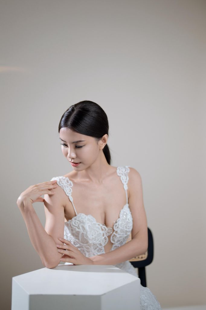 Bridal portrait with sweetheart lace bodice and elegant updo