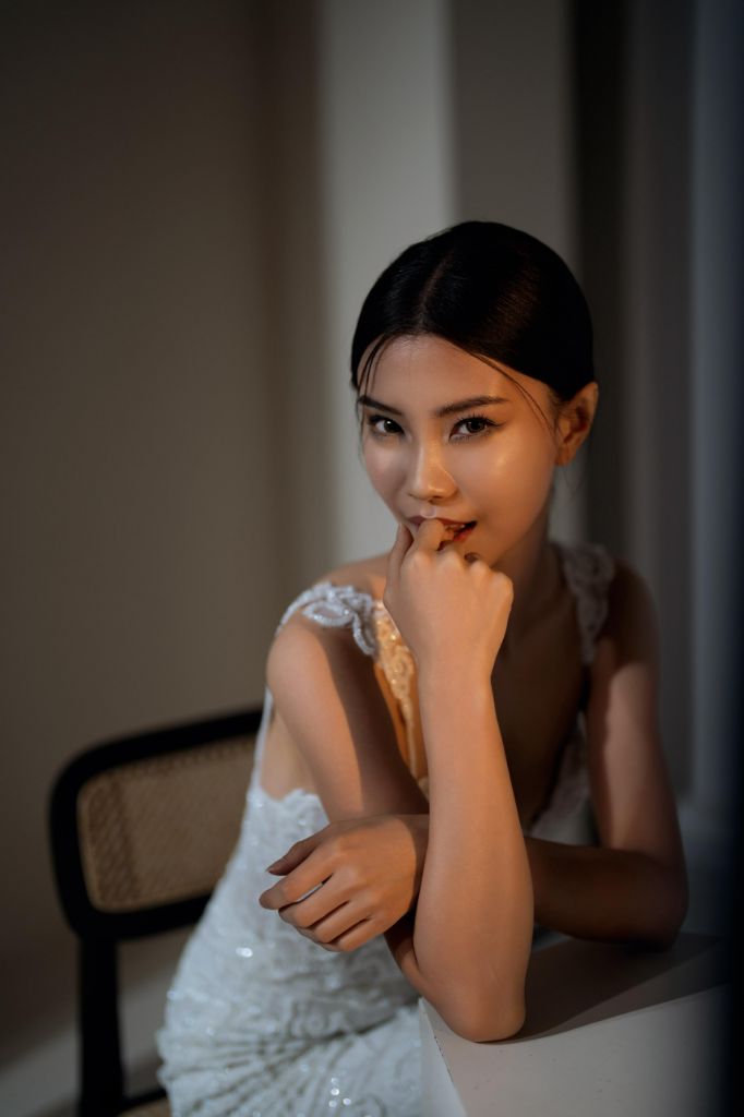 Bridal portrait in moody studio lighting